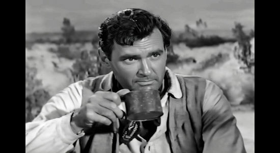 Jeff Morrow as Hack Williams, promising on his one-time sergeant's honor not to peek while Nora is bathing in Copper Sky (1957)