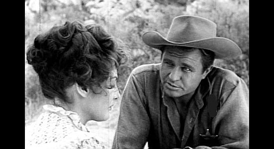 Jim Davis as Marshal Matt Gordon, trying to explain Cheney's bleak future to Sherry (Allison Hayes) in A Lust to Kill (1958)