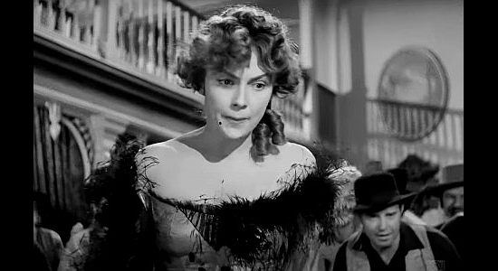 Joan Leslie as Sally Maris, hovering over Kate Quantrill after a catfight in The Woman They Almost Lynched (1953)