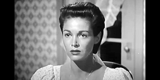 Joan Taylor as Anne BeBeau, trying desperately to keep her brother Armand out of trouble in Apache Woman (1955)