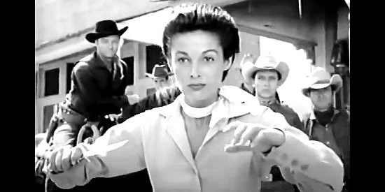 Joan Taylor as Anne LeBeau, a half-breed ready to knife a man for calling her a dirty squaw in Apache Woman (1955)