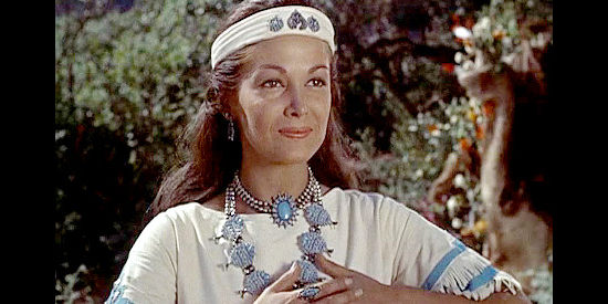 Joan Taylor as Riva, signaling her affect for Mangus on their wedding night in War Drums (1957)