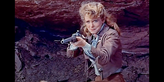 Joan Vohs as Melanie Crown, springing into action as the Apache attack in Fort Yuma (1955)