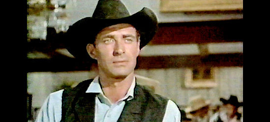 Jock Mahoney as Marshal Allan Burnett, trying to show patience with the gunman who saved his life in A Day of Fury (1956)