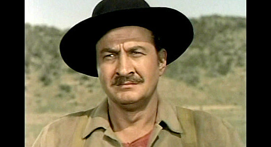 Joel Ashley as Swenson Brink, watching Hampton's cattle trample his fences and his crops in Tension at Table Rock (1956)
