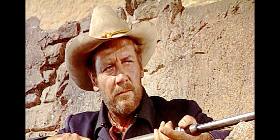 Joel McCrea as Sgt. Vinson, a cavalry commander haunted by the death of his wife and children in Fort Massacre (1958)