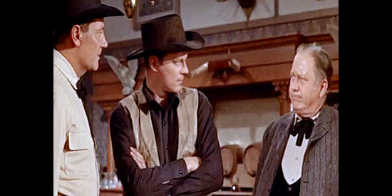Joel McCrea as Wyatt Earp, ordering Doc Black (Edgar Buchanan) out of town while brother Morgan (Peter Graves) looks on in Wichita (1955)