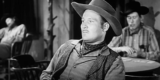 John Dennis as Kid Stanley, one of the Hole in the Wall gang members the Pinkertons are after in The Return of Jack Slade (1958)