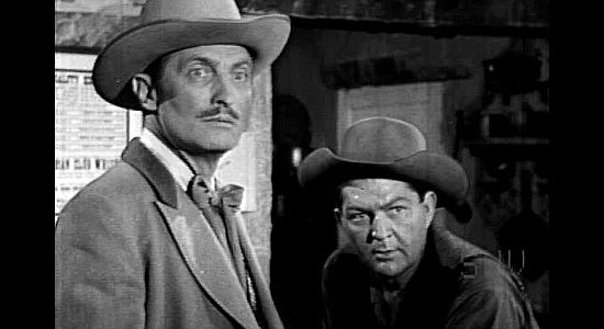 John Holland as Mayor McKenzie and Tom Hubbard as Deputy Kane Guthrie, stunned to learn help won't be coming from the marshal in A Lust to Kill (1958)