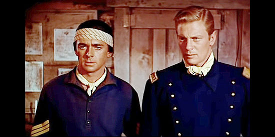 John Hudson as Sgt. Jonas and Peter Graves as Lt. Ben Keegan, receiving orders for the mission ahead in Fort Yuma (1955)