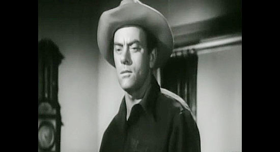 John Ireland as Jefferson Waring, a Civil War vet looking to avoid violence only to stumble into a war over homesteaders in The Bushwhackers (1952)