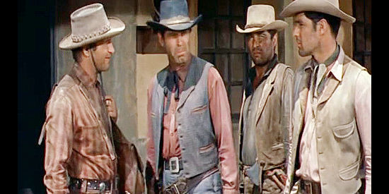 John Larsh as Heller, Fred MacMurray as Gentry, Sydney Chaplin as Gato and John Gaven as Teach, pinned down in a ghost town in Quantez (1957)