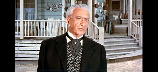 John Litel as Charles Summerton, trying to get Allison to leave town so his daughter man marry the richest man around in Decision at Sundown (1957)