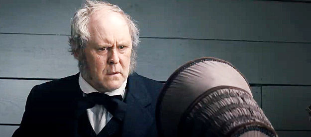John Lithgow as Rev. Alfred Dowd, talking to Mary Bee about the journey ahead in The Homesman (2014)