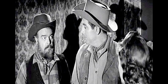 John Merton as Shorty, the mute miner Sylvia Melbourne stakes, being questioned by Curt Darrow in Frontier Gambler (1956)