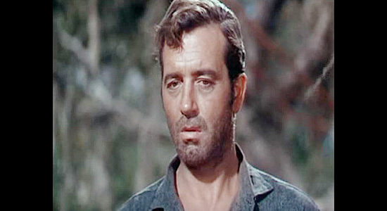 John Payne as Rockwell Grayson, returning home from the Civil War a seemingly defeated man in The Vanquished (1953)