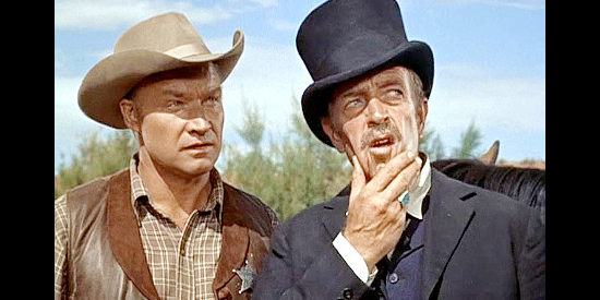 John Pickard as Sheriff Bullard and Richard H. Cutting as Judge Benton, listening to Luke Fargo's suggestion for dealing with Mangus and the Apaches in War Drums (1957)