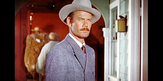 John Ridgely as Hanes, a railroad detective who recognizes Al Jennings when he flees to New Orleans in Al Jennings of Oklahoma (1951)