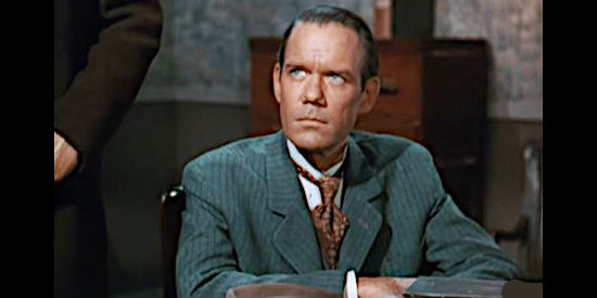 John Ridgely as Henry Travers, a government agent eager to reach California to establish law and order there in Fort Osage (1952)