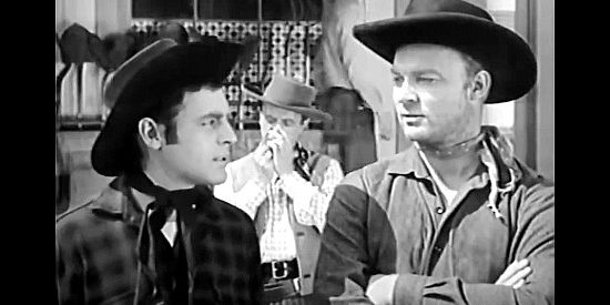 Jonathan Haze as Tom Chandler and Morgan Jones as Macy, pinning the blame for a string of holdups and killings on the Apache in Apache Woman (1955)