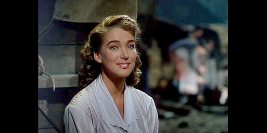 Julie Adams as Laura Baile, the woman McLyntock has to leave behind in Portland in Bend of the River (1952)