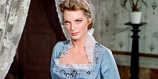 Julie London as Helen Colton, challenging Martin Brady to set aside his violent ways in The Wonderful Country (1959)