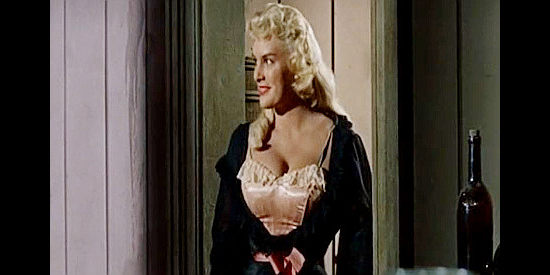 June 'Va-Va-Vroom' Wilkinson, one of the saloon girls helping keep Lon Bennett from his wagon guide duties in Thunder in the Sun (1959)