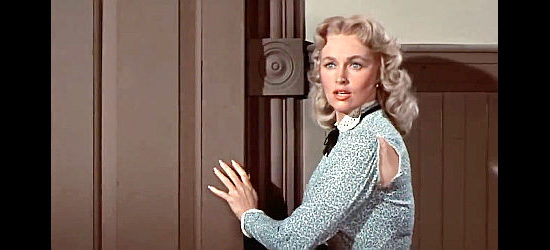 Karen Steele as Lucy Summerton, preparing to give Bart Allison a lesson in women. She'll get a smack on the bottom from an ungrateful Allison as a reward in Decision at Sundown (1957)