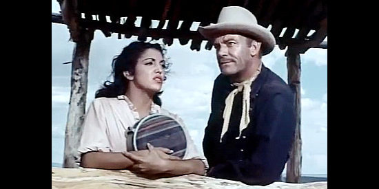 Katy Jurado as Mara Fay and Dennis O'Keefe as Capt. Matt Riordan, pondering their chances in Dragoon Wells Massacre (1957)