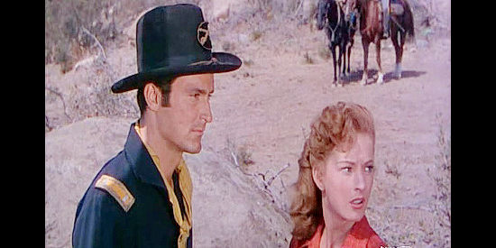 Keith Larsen as Lt. Steve King and Coleen Gray as Christella Burke, discussing a deserter's future in Arrow in the Dust (1954)