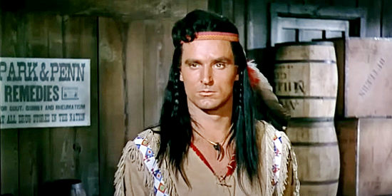 Keith Larsen as Taslik, Gray Cloud's son, convinced a treaty isn't in his tribe's best interest in War Paint (1953)