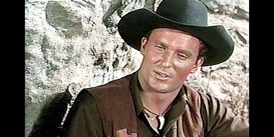 Keith Larsen as The Kid, willing to cooperate with the sheriff in the theft of a gold shipment in Son of Belle Starr (1953)