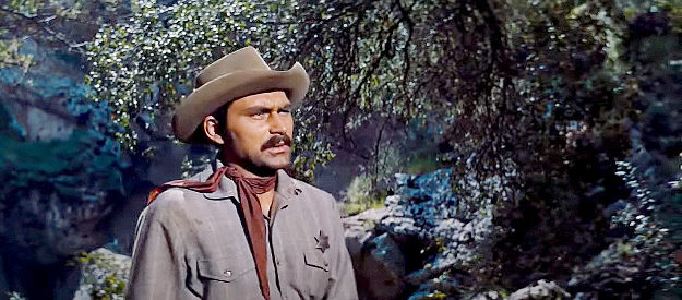 Ken Scott as Deputy Primo, the man leading the search for four outlaws after the sheriff is wounded in The Bravados (1958)