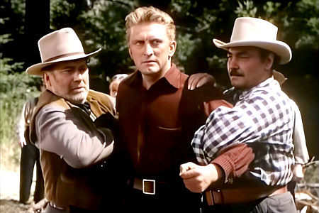 Kirk Douglas as JIm Fallon, in trouble after one of his falling trees claims a life in The Big Trees (1952)