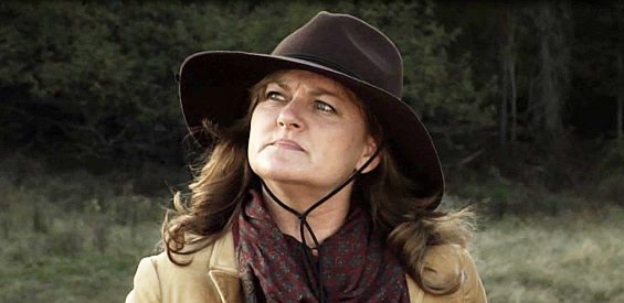 LaDon Hart Hall as Maggie Carter, left to run her husband's ranch after his death in Day of the Gun (2013)