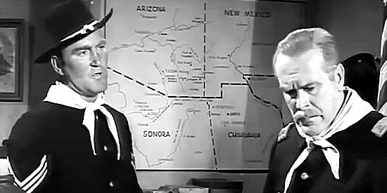Lane Bradford as Sgt. Grant reporting to Maj. Reid (Damian O'Flynn) in Apache Warrior (1957)