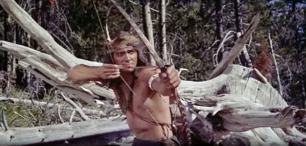 Larry Pennell as Wild Eagle, believing Sacajawea has been pledged to him and determined to take her in The Far Horizons (1955)