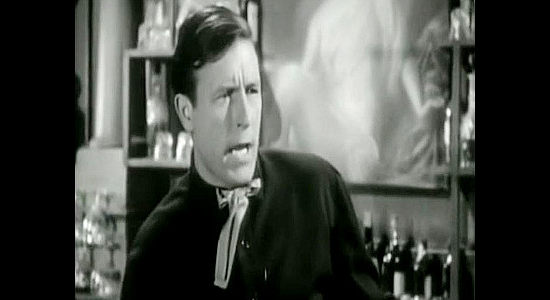 Lawrence Tierney as Sam Tobin, the man leading Taylor's efforts to chase off the homesteaders in The Bushwhackers (1952)