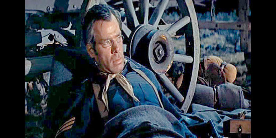 Lee Marvin as Sgt. Lloyd Carracart, wounded by ready for the next Indian attack in Pillars of the Sky (1956)