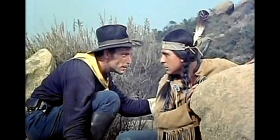 Lee Van Cleef as Private Benton, forcing Wingfoot (Maurice Jara) to help his escape in The Nebraskan (1953)