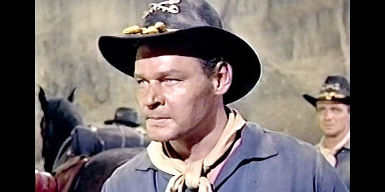Leo Gordon as Zimmerman, a headstrong trooper with little faith in his commanding officer in Apache Territory (1958)