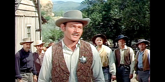 Leo Gordon as the sheriff, investigating a murder in Tennessee's Partner (1955)