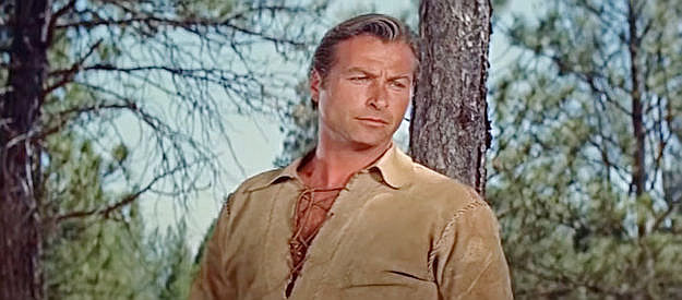 Lex Barker as Deerslayer, coming upon two women in the forest in The Deerslayer (1957)