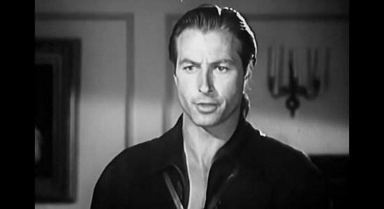 Lex Barker as Kent McIntire, convinced war with the Native Americans would be foolhardy for the greatly outnumbered British in Battles of Chief Pontiac (1952)