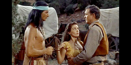 Lex Barker as Mangus reclaims his captive just as Riva (Joan Taylor) and Luke Fargo (Ben Johnson) were getting closer in War Drums (1957)