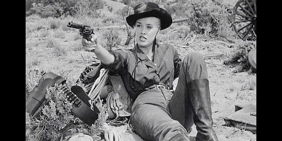 Lisa Davis as Rose Dalton, singing about her her gun is her one true love in The Dalton Girls (1957)