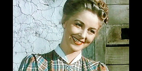 Lois Hall as school teacher Susan Wilson, being serenaded by Singalong in Slaughter Trail (1951)