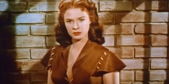 Mala Powers as Rose, determined to find the men who killed her adoptive Indian parents in Rose of Cimarron (1952)