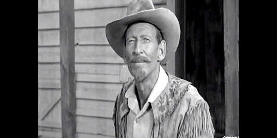 Malcolm Atterbury as Buffalo Bill, injured by a buffalo but ready to help Pat Garrett any way he can in Badman's Country (1958)