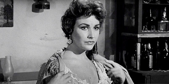 Mara Corday as Louisa Jackson, the sheriff's niece who decides she wants to sing at the Four Aces Saloon in Naked Gun (1956)